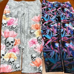 Two pair Evolution and Creation yoga pants. Skull is Medium. and Fish are small